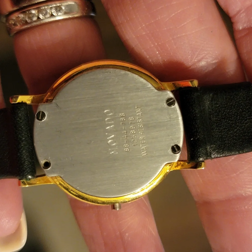 Movado Black and Gold Wearable Watch - Picture 8 of 10